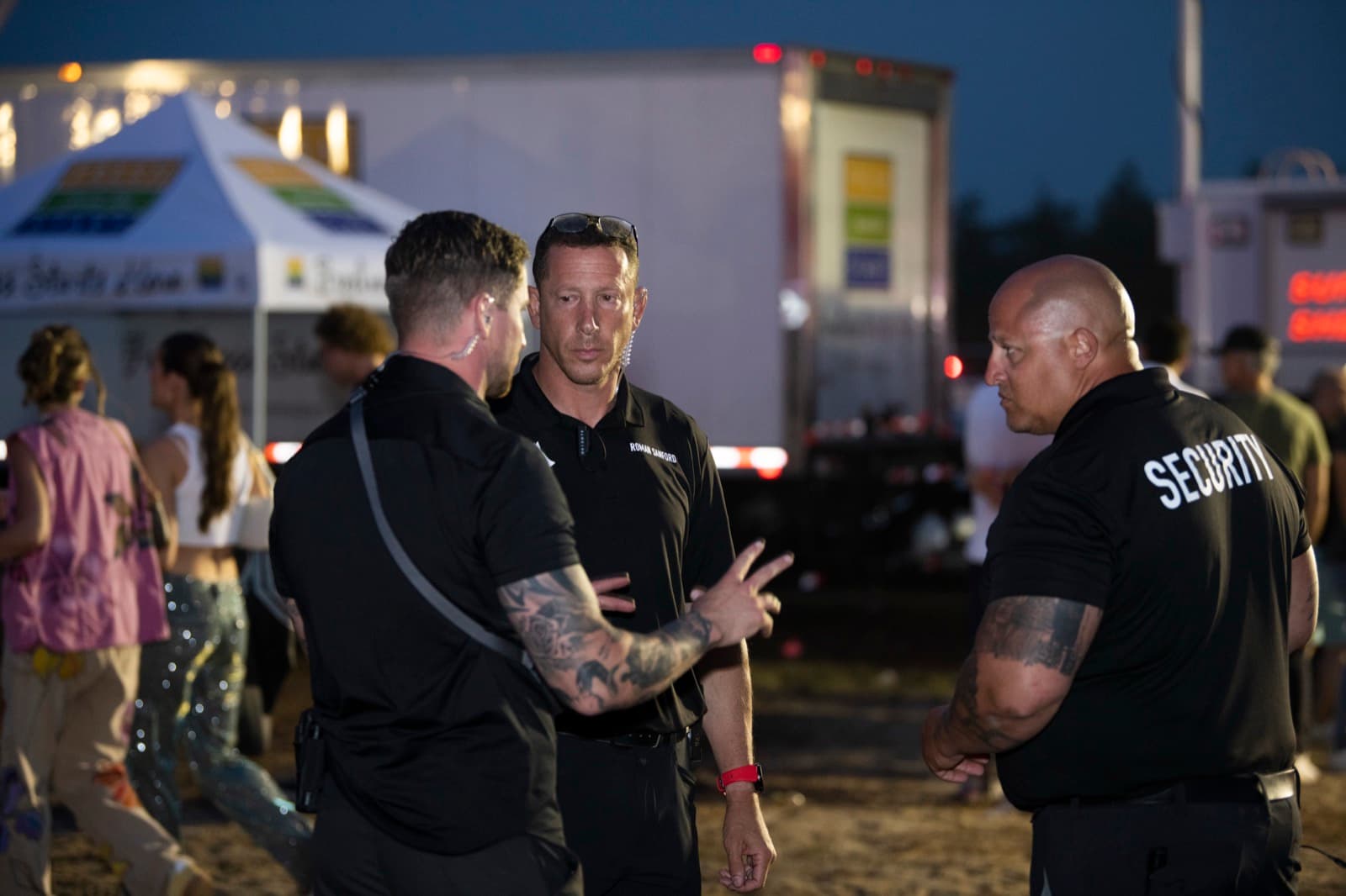 Security team briefing at outdoor event