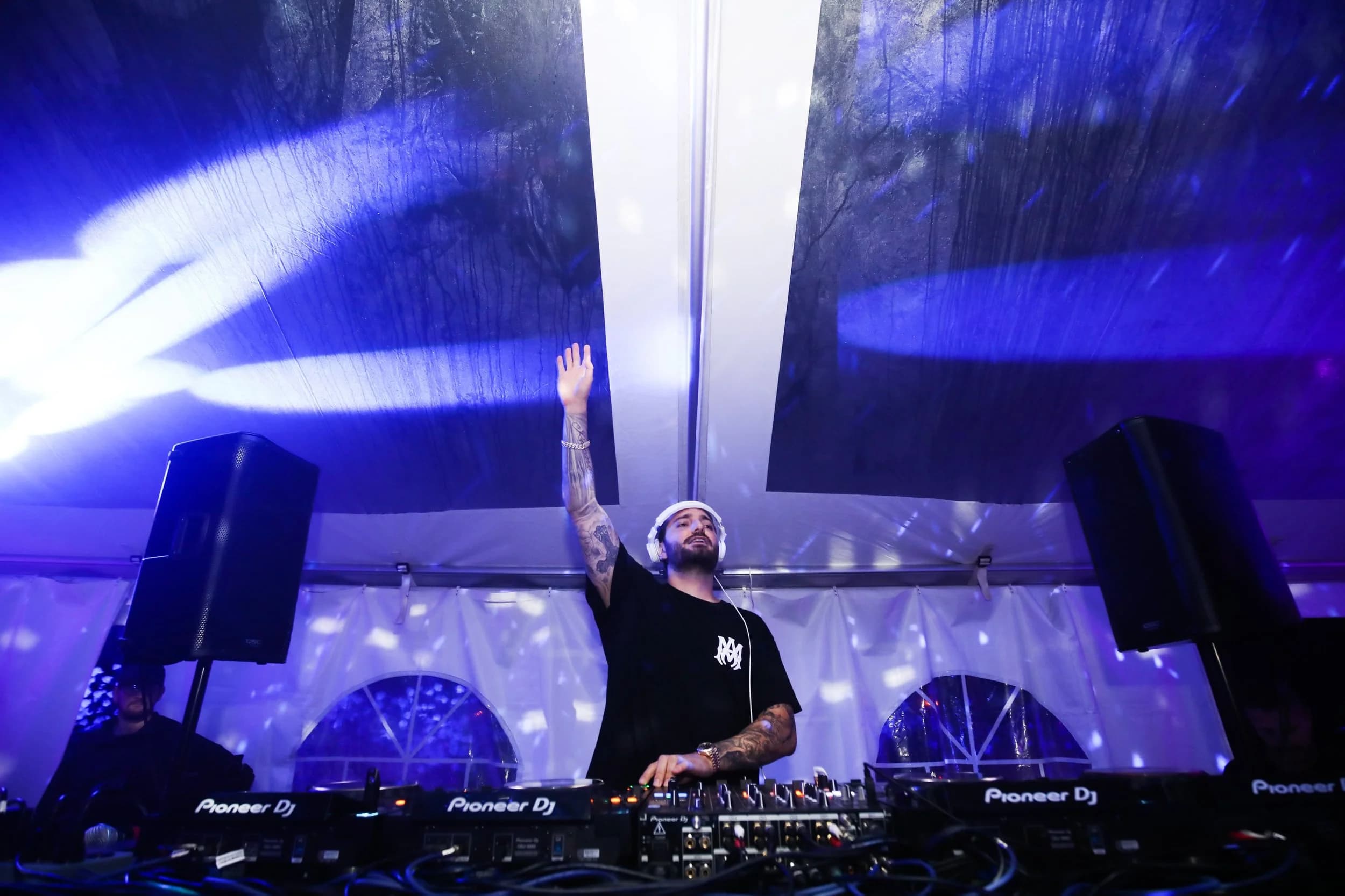 DJ performance security at Hamptons tent event