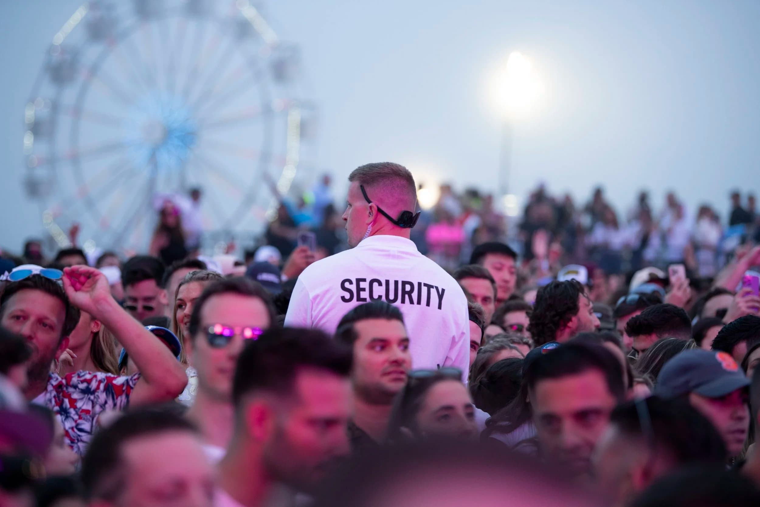 Security agent crowd overwatch at festival